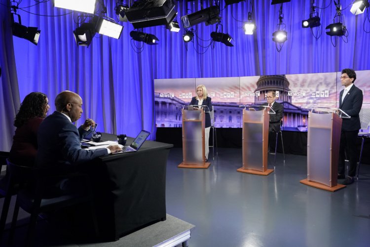 Largely aligned on policy, NY-12 debate candidates turn to
biography