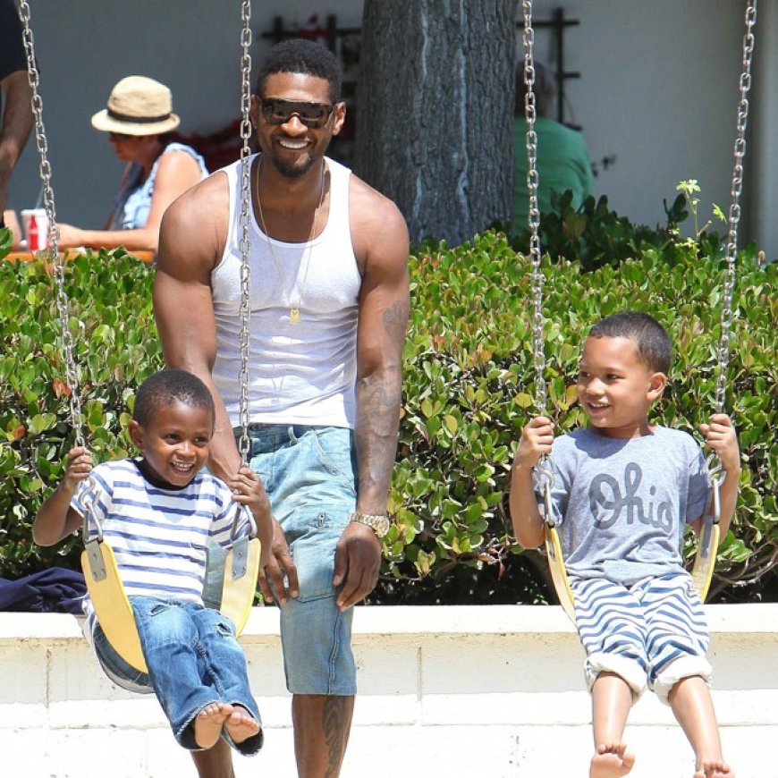 American Singer Usher with his son