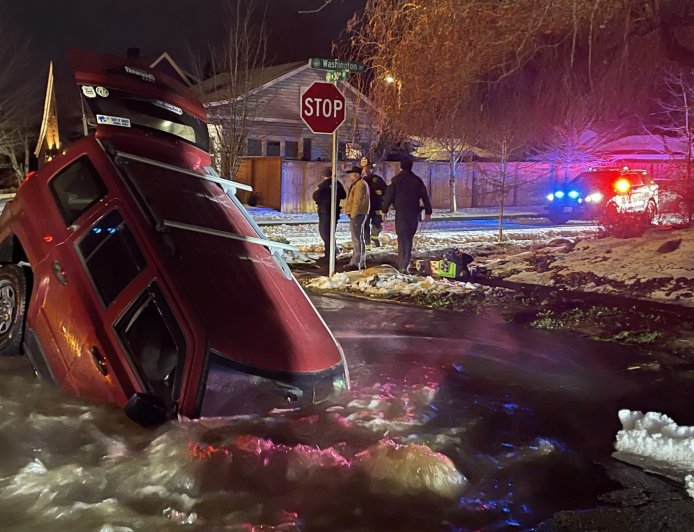 Vancouver Sinkhole Incident: Washington Couple's Shocking Car Plunge Captured in Video