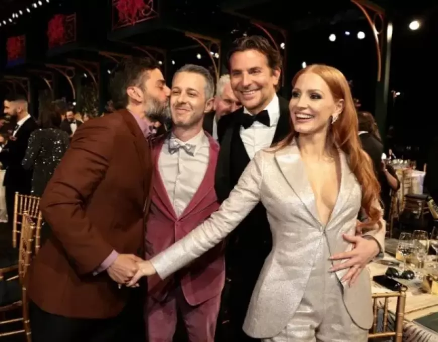 "Captured in a memorable moment, Oscar Isaac, Jeremy Strong, Bradley Cooper, and Jessica Chastain gather for a photo. (Photo credit: Dimitrios Kambouris/Getty Images for WarnerMedia)